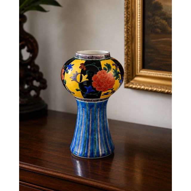 A striking and unusual Japanese Kutani porcelain vase executed in the celebrated Ao-Kutani (Aode) Yoshidaya tradition with...