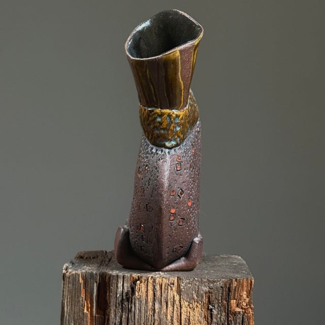 Vintage Postmodernist Hand Built Surrealist Ceramic Vessel. Narrow ceramic vessel with two tone body and dark mustard...