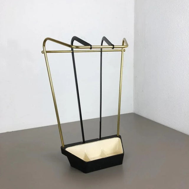 Bauhaus umbrella stand Origin: Germany Age: 1950s This original vintage Bauhaus style umbrella Stand was produced in the...