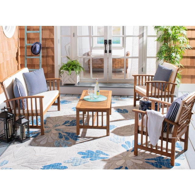 The open and airy design of the Rocklin 4 Piece Outdoor Set beautifully combines form and function. Its slatted silhouette...