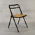 Set of 8 folding chairs by Giorgio Cattelan for Cidue, designed in the 1970s. Frame in black lacquered curved metal and...