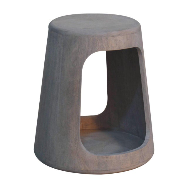 A contemporary piece that combines minimalist design with rustic charm. The open, hollow design adds a sense of lightness...