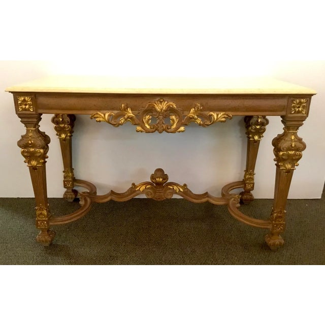Original retail $6988, elegant Neoclassical style hand-carved gold Italian console table, beige marble top, Louis IV...
