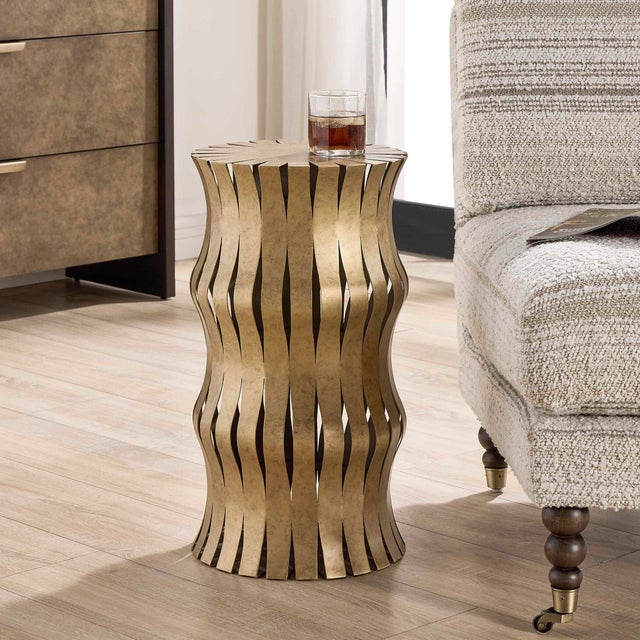 A True Conversation Starter, This Accent Table Boasts An Intricate, Undulating Silhouette Crafted Entirely From Steel In A...