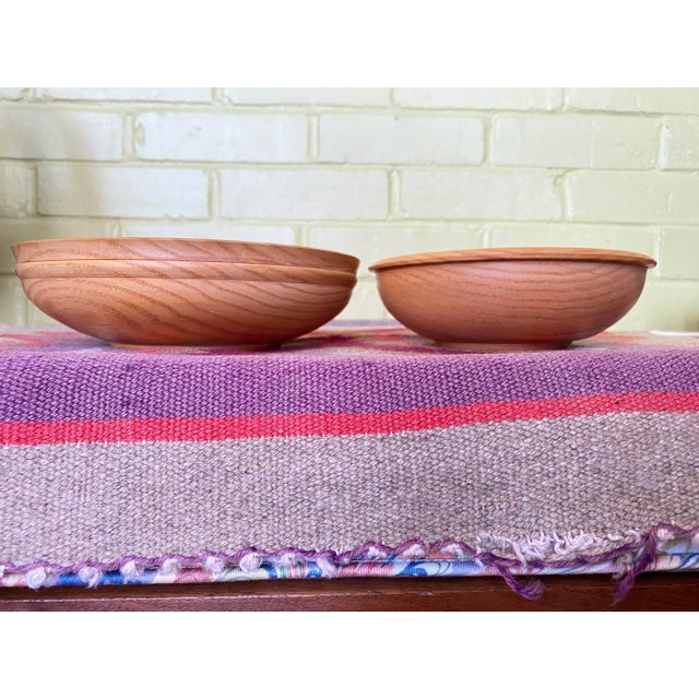 The sale is for a beautiful pair of turned wooden bowls by North Carolina craftsman Rodger Jacobs. They are both in Ash,...