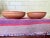 The sale is for a beautiful pair of turned wooden bowls by North Carolina craftsman Rodger Jacobs. They are both in Ash,...