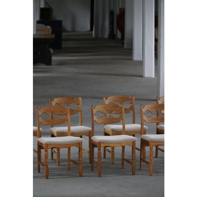 An exceptional set of 8 dining chairs designed by Henning Kjærnulf for E.G. Møbelfabrik, Denmark, in the 1960s. Known as...
