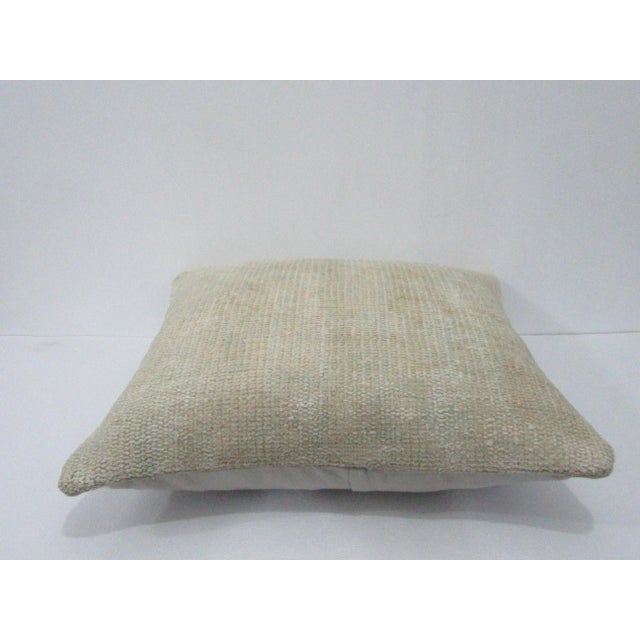 Decorative pillow cover made from a vintage Turkish handknotted rug. Backed with good quality cotton fabric. Pillow...