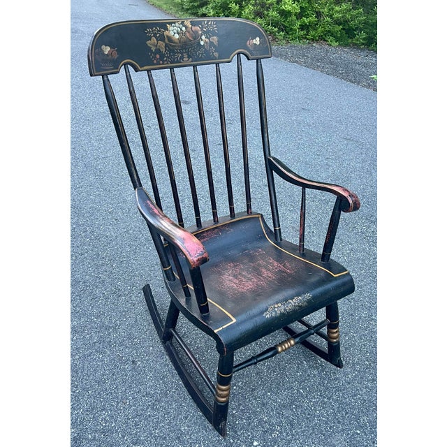 Antique 19th Century Boston Rocker. Classic Americana with its original paint decoration. Original black over red paint...