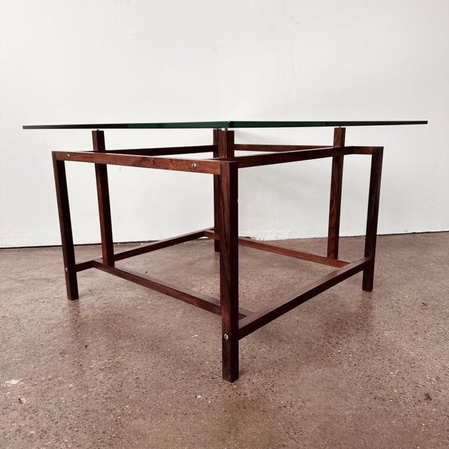 Vintage mid-century Danish rosewood and glass square side table, by Henning Norgaard for Komfort circa 1970s. Features a...