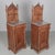 A pair of tall Italian Renaissance Revival marble top nightstands made of solid walnut with architectural details...