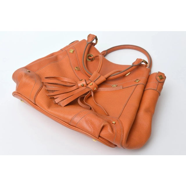 1970s Vintage MCM Orange Leather and Gold Plated Tassel Hand Bag For Sale - Image 5 of 10