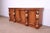An outstanding Empire or Egyptian Revival style sideboard, credenza, or bar cabinet By Drexel Heritage, "Pavilion"...