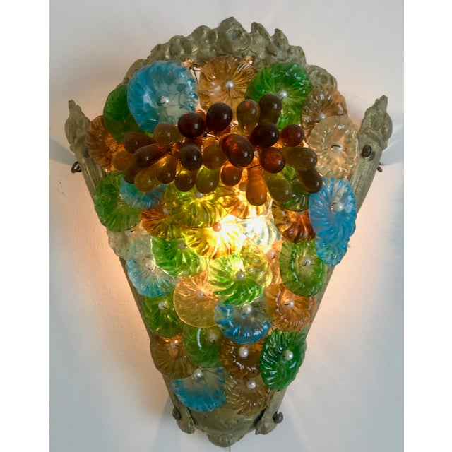 A delightful and colorful Murano glass sconce. This is one of six in my collection and each has its own color story.