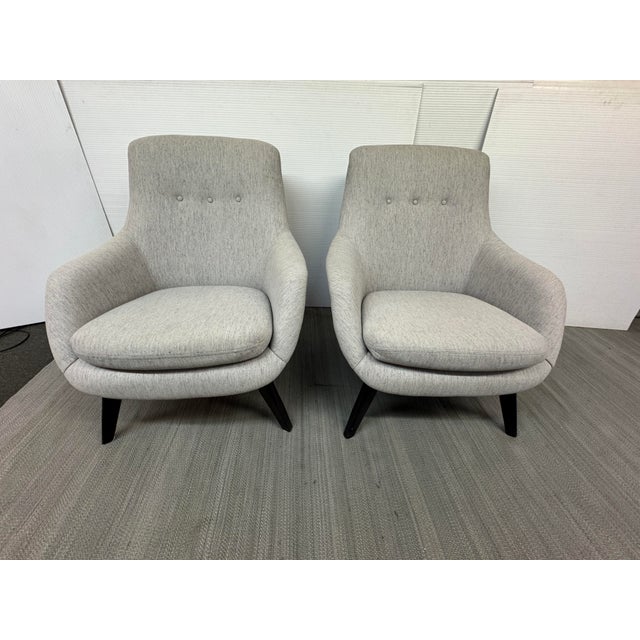 Design Plus Gallery presents a Pair of Henrick Lounge Chairs from Room & Board. The chairs have contemporary, clean lines...