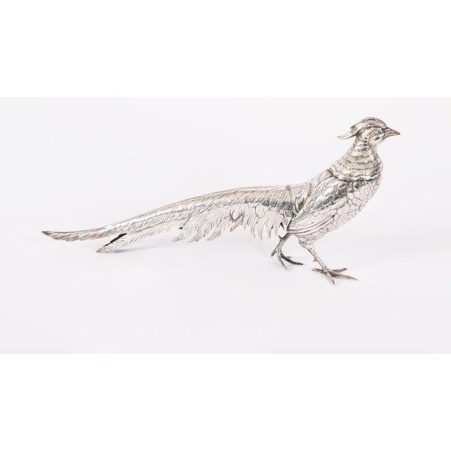 This is a stunning Antique pair of Scandavian cast solid silver pheasants with exceptional detailing to the modelling of...