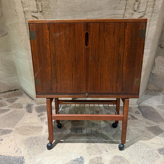 For your consideration, a Danish Mid-Century Modern cocktail/bar cabinet designed by Svend Langkilde. Produced by his own...