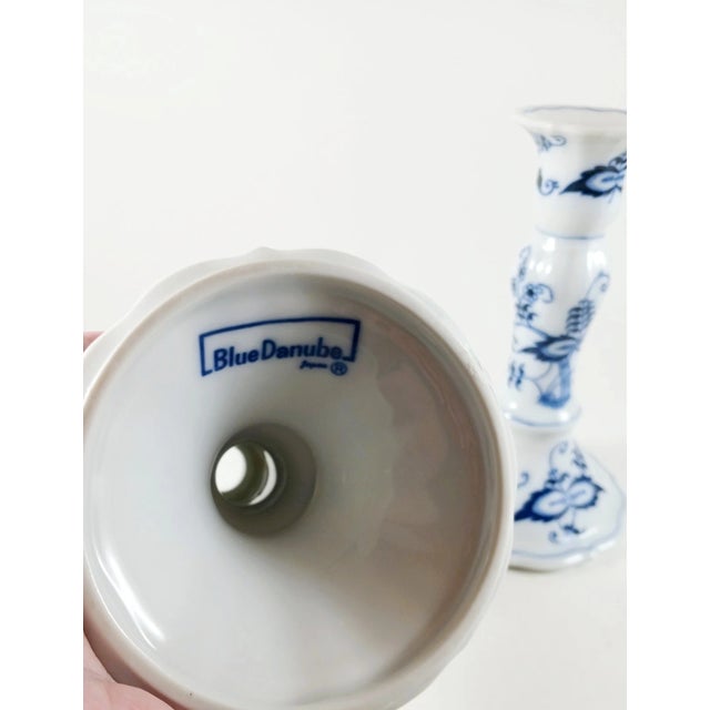 Add timeless elegance to your home with this beautiful pair of Vintage MCM Blue Danube Porcelain Candlesticks. Featuring...