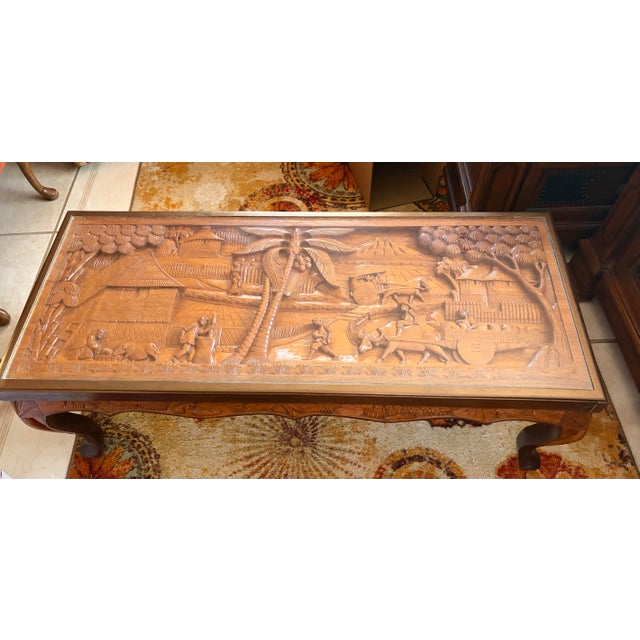This mid-century vintage piece from Paete, Philippines, dates back to the 1950s and is meticulously hand-carved from solid...