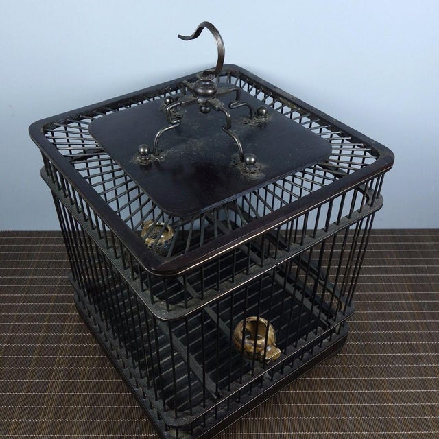 Vintage Dark Wood Birdcage With Bronze Wire and Ceramic Feeders For Sale - Image 4 of 8