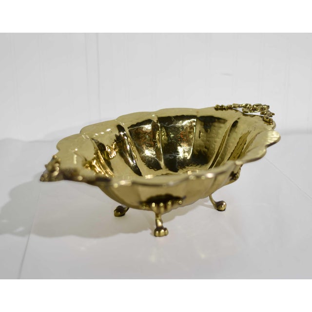 This is a warm metallic accent with just the right amount of texture. Our mid century brass cachepot features a hammered...