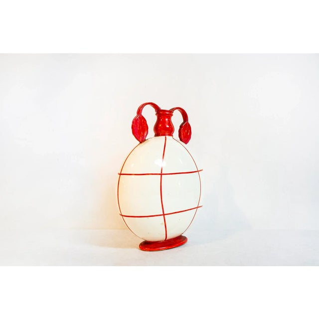 Spherical ceramic vase with a double phytomorphic handle. Model: Monza 83 Designer: Guido Androvitz Produced by Società...