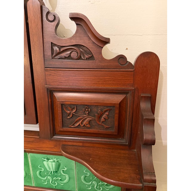 This English walnut dresser features a dramatic marble top, lovely Spring green tile backsplash and a little bit of...
