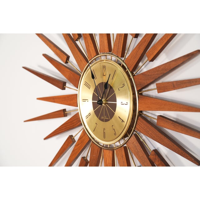 Designer: Seth Thomas Style: Mid-Century Modern Period: 1960's Origin: USA Materials: Wood, Metal, Brass Condition: Age-...