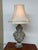 Design Plus Gallery presents a Vintage Style Table Lamp. Embellished with dolphin and shell motifs from top to bottom,...