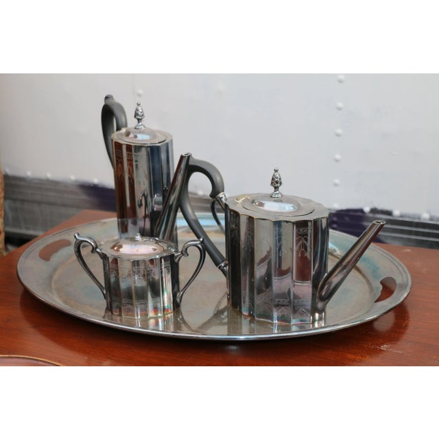 Gorgeous Silver Smith tea set in well kept condition.. Missing the sugar lid other than that its complete and well kept....