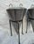 Vintage industrial candle holders and stands . Done in a cone shape in stainless steel with iron stands . Acquired from an...