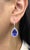 These breathtaking earrings feature 12.65 carats of natural tanzanite, radiating a rich and captivating blue-violet hue....