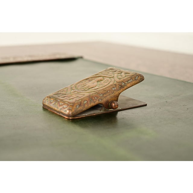 A gorgeous antique Arts & Crafts or Art Deco period bronze "Zodiac" pattern large paper clip By Tiffany Studios (signed to...