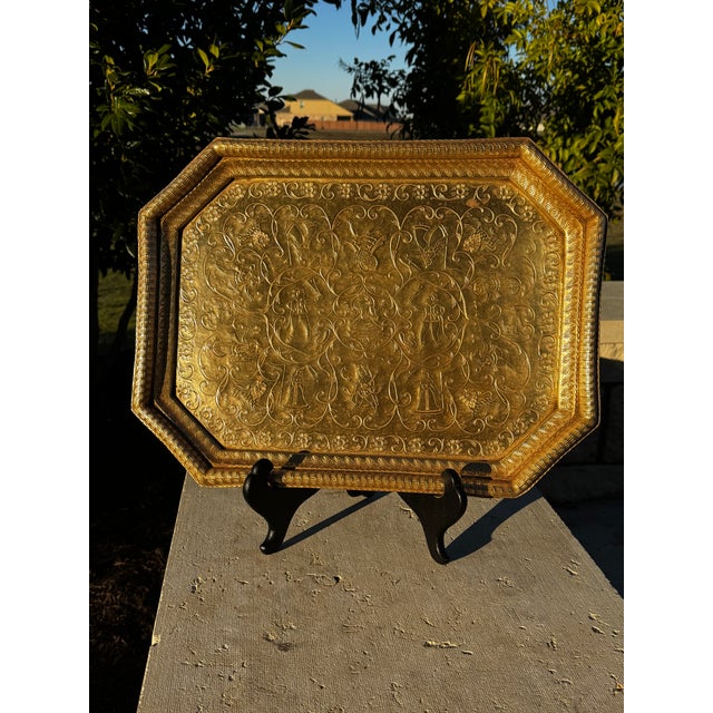 Vintage or possibly antique heavy brass elongated octagonal serving tray or plaque. Decorated with etched ethnic and Hindu...