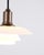 Ph 2/1 pendant lamp designed by poul henningsen and manufactured by louis poulsen. The lamp is made of burnished brass...