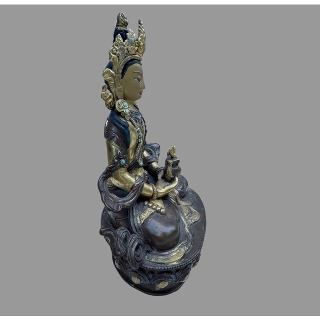 Decorative Tibetan/Himalayan-style gilt bronze or gilt copper-alloy figure of Amitayus, the Buddha of Infinite Life and...