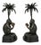 Presenting a highly decorative and whimsical pair of vintage cast metal candle holders, featuring finely detailed monkeys...