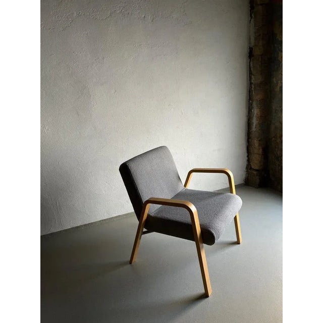 Vintage birch easy chair with new gray upholstery. Origin: Scandinavia Design period: 1980s Condition: good vintage...