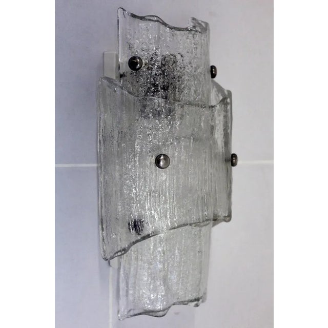 - White lacquered metal frame - 3 heavy shades made of dispersion glass - Single-flame E27 socket European Plug (up to...