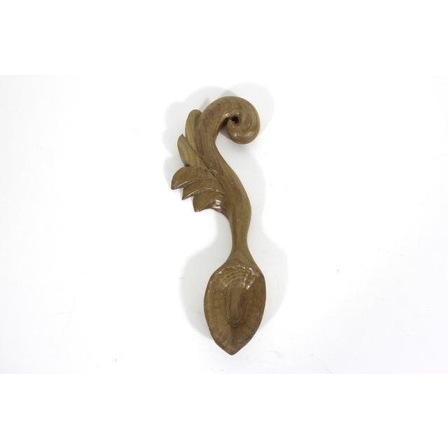 Vintage hand carved wooden spoon in the style of a Welsh love spoon. The last photo shows other spoons available...