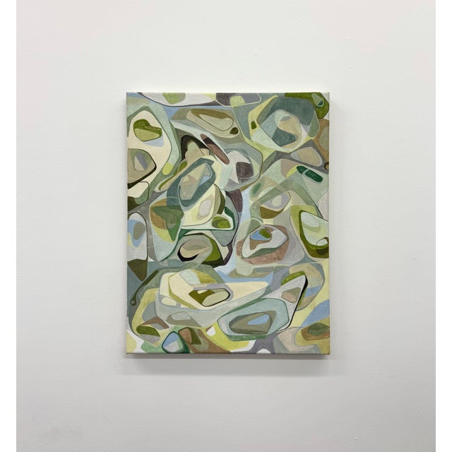 A contemporary abstract painting composed of flowing organic forms in soft sage, olive, cream, taupe, and pale blue tones....