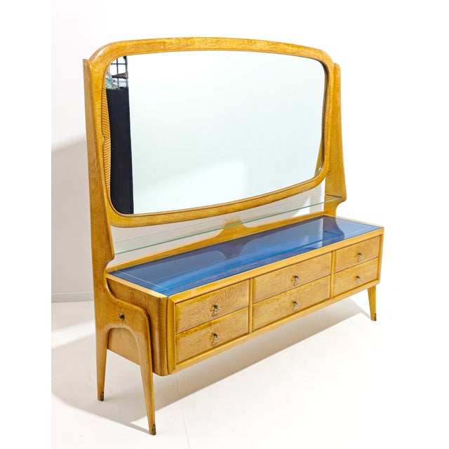 Vintage sideboard with mirror, a classic example of mid-century Italian design (1950s/60s). Made of light wood, it...