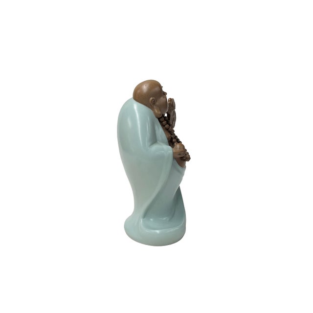 Joyful Laughing Buddha Light Celadon Robe Ceramic Coin Bat Ru Yi Figure For Sale - Image 4 of 13