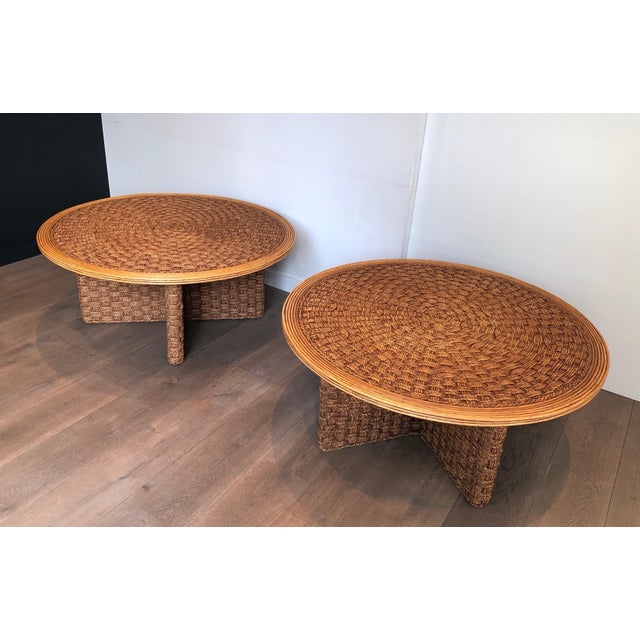 This is a rare pair of large round coffee tables. These tables are made of wood and have very beautiful and fine rope...
