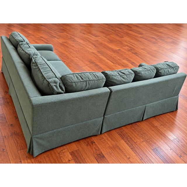 Beautiful custom-made Kravet sectional sofa featuring elegant green chenille upholstery, upgraded seat cushions for added...
