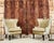 Beautifully weathered pair of leather butterfly wingback chairs made in the mid-century modern style by Williams-Sonoma....