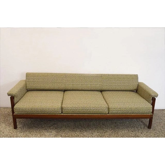 Sofa bed of Scandinavian production of the 1960s. Rosewood structure with base, padding and fabric completely restored,...