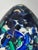 This Murano glass paperweight, produced in Italy in the 1990s, is formed as an egg-shaped sculptural object, combining...