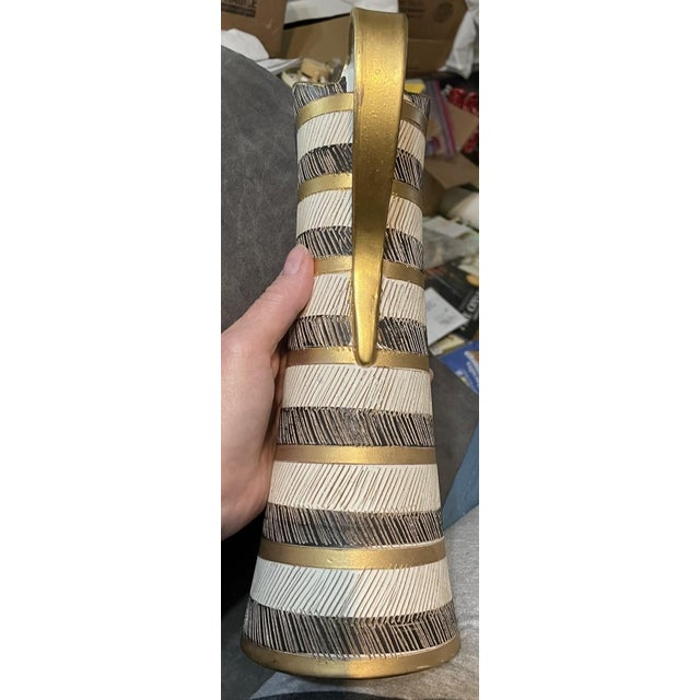 Mid-Century Modern Italian Bitossi "Seta" Ceramic Pitcher Attributed to Aldo Londi This exquisite vintage pitcher is a...