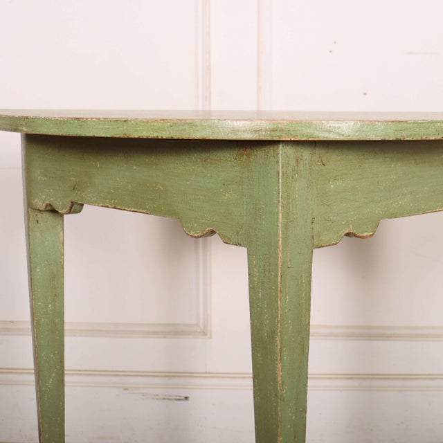 Pretty late 19th century English painted demi-lune pine console table. 1890. This piece is designed in the style of the...